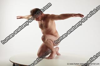 reference of kneeling belo 18